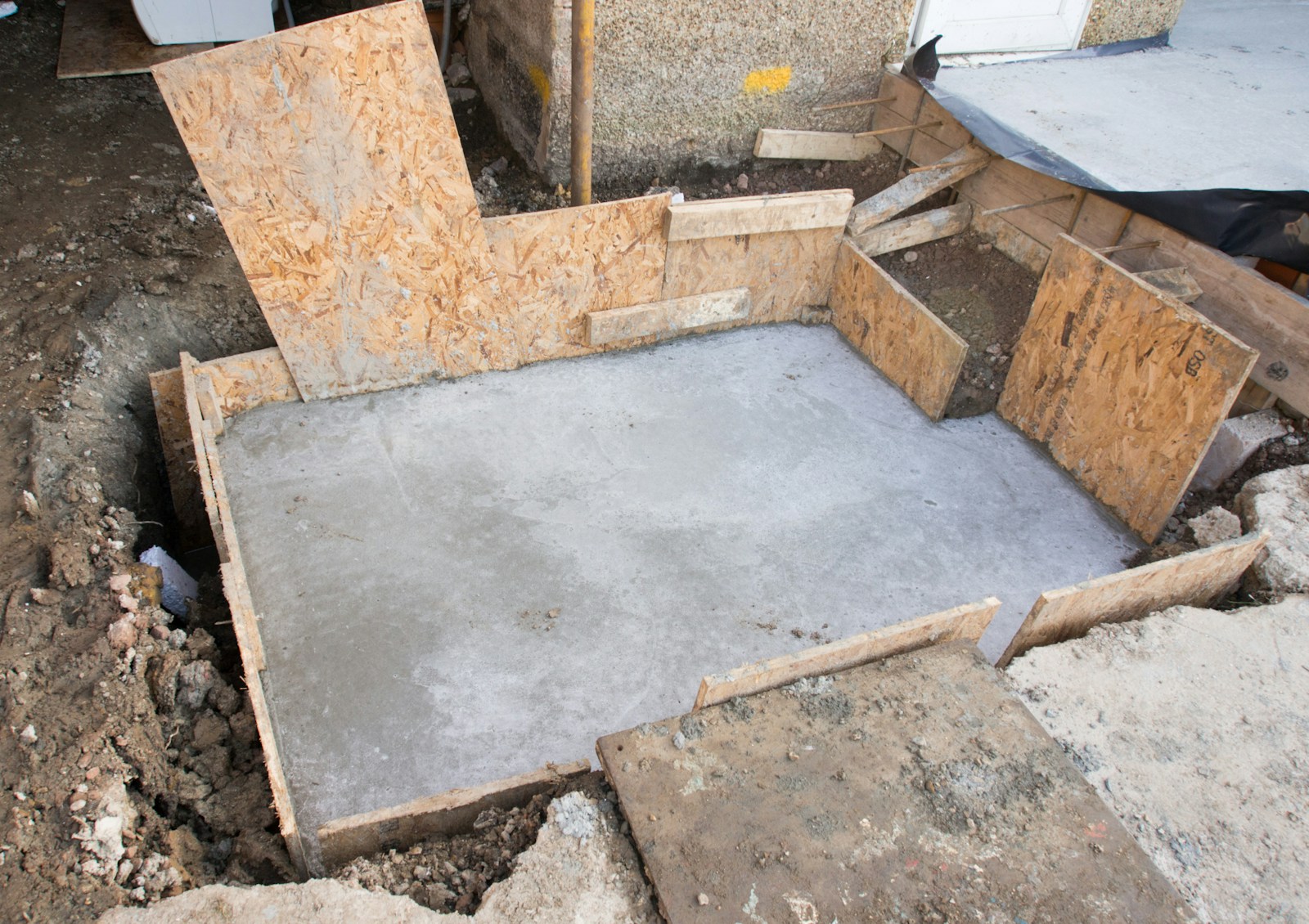 Poured concrete foundation in formwork