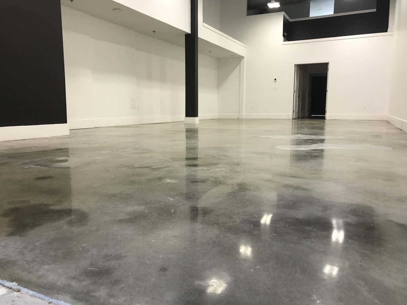 Polished concrete floor in an empty commercial space